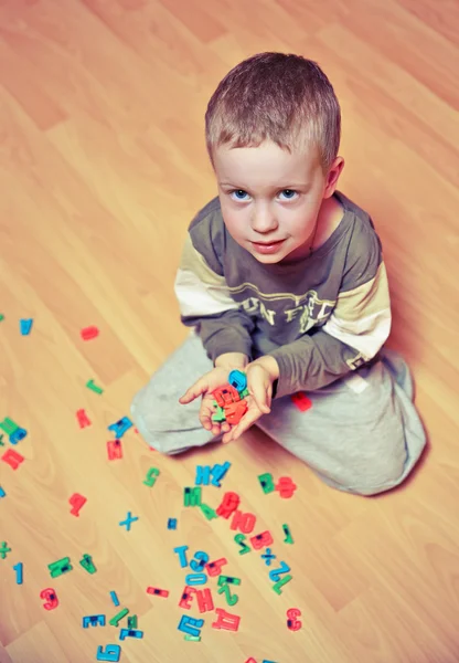 Boy with alphabet — Stock Photo, Image