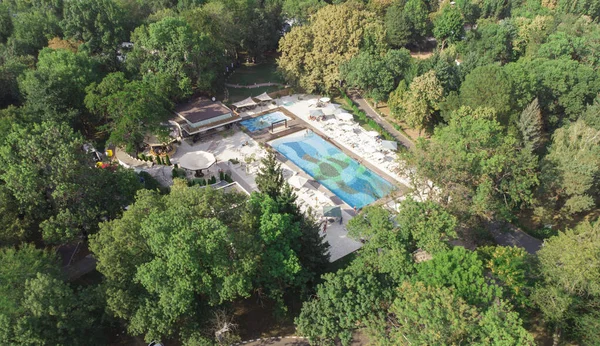 water park with pool in forest. aerial view