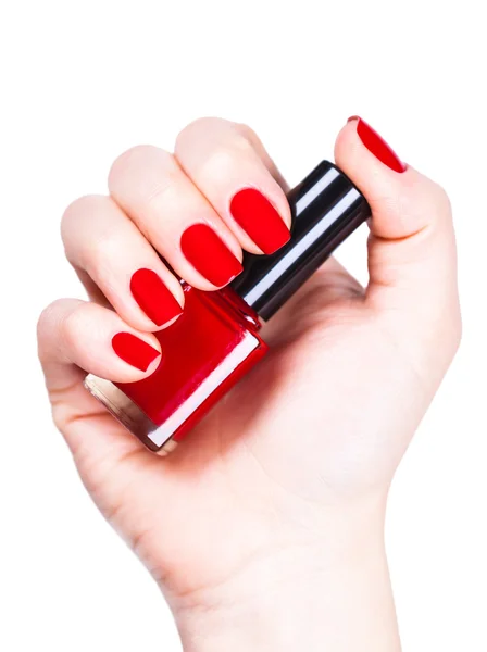 Esmalte de uñas rojo en una mano —  Fotos de Stock