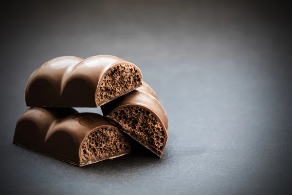 Parte porosa de chocolate close-up — Fotografia de Stock