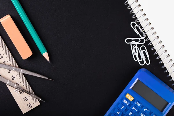 Notebook, calculadora, borrador, regla, brújula y lápiz — Foto de Stock