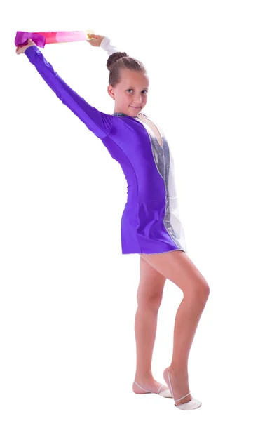 Chica gimnasta de pie con cinta —  Fotos de Stock