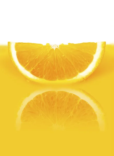Fatia em suco de laranja — Fotografia de Stock
