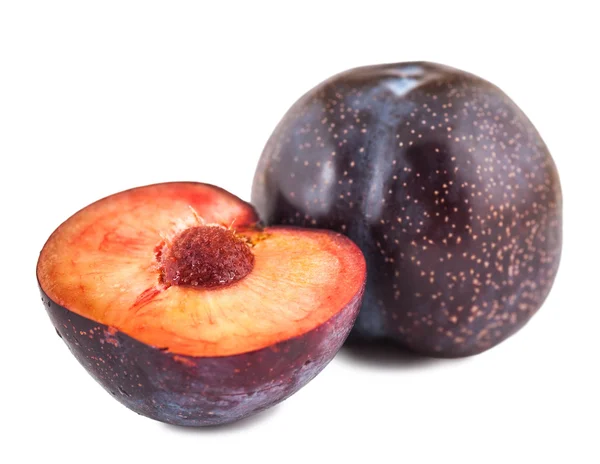 Whole plum and half — Stock Photo, Image