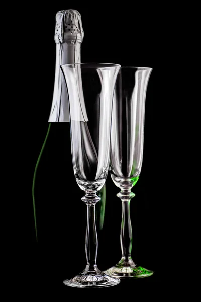 Bottle of champagne and empty glasses — Stock Photo, Image