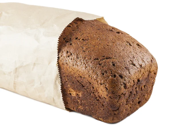 Brązowy chleb w papier opakowania — Zdjęcie stockowe