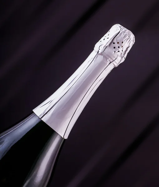 Closed bottle of champagne — Stock Photo, Image