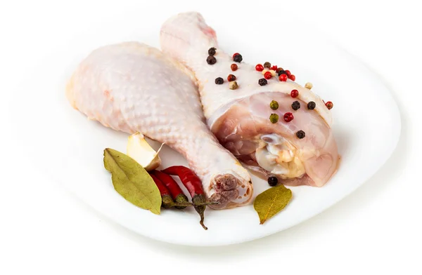 Raw chicken feet on the plate with spices — Stock Photo, Image