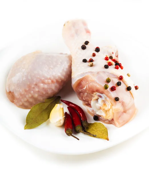 Chicken feet on the plate with spices closeup — Stock Photo, Image
