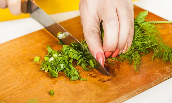 Cook finely shred dill and parsley — Stock Photo, Image