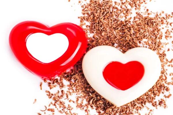 Želé v podobě dvou srdcí s nastrouhanou čokoládou detail — Stock fotografie