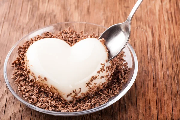 Cioccolato alla gelatina di vaniglia con un cucchiaio — Foto Stock