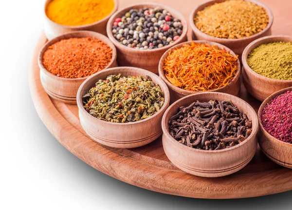 Set spices in a wooden bowl close-up — Stock Photo, Image