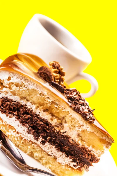 Pedaço de bolo e uma chávena de café — Fotografia de Stock