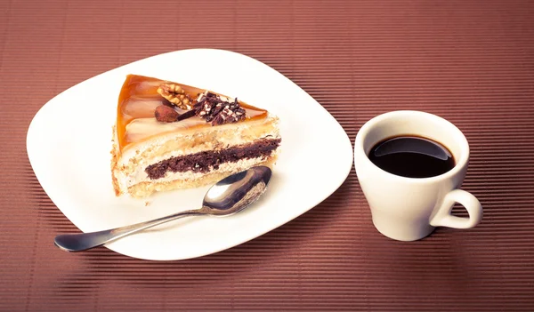 Stück Kuchen und eine Tasse Kaffee — Stockfoto