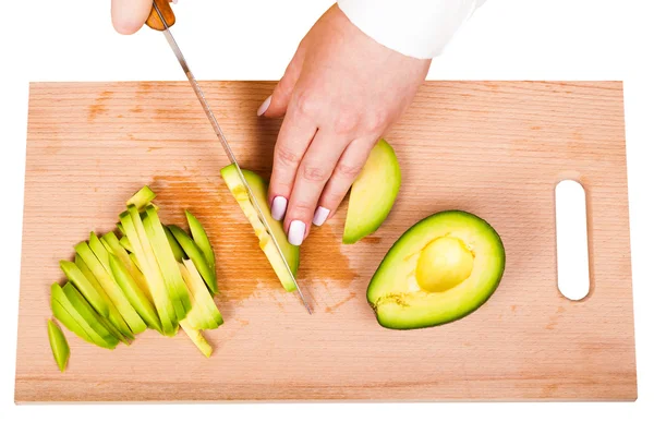 Chef-kok snijden de avocado — Stockfoto