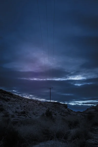 Pólo elétrico da tensão no por do sol — Fotografia de Stock