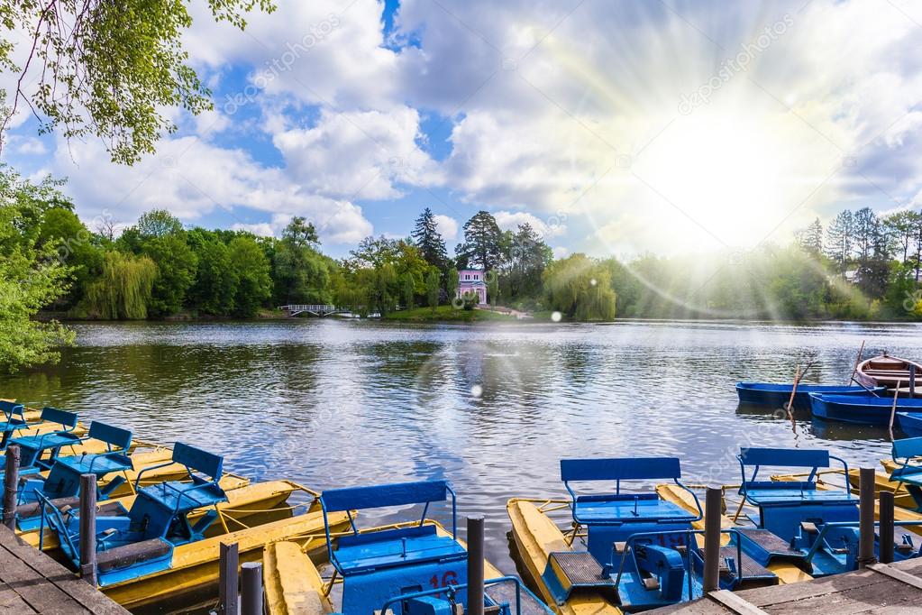 landscape lake with pedal boats 