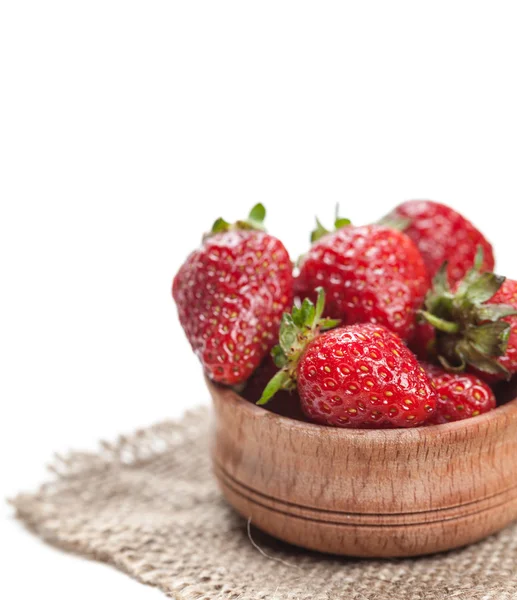 Ripe strawberry in wooden bowl — Stock Photo, Image