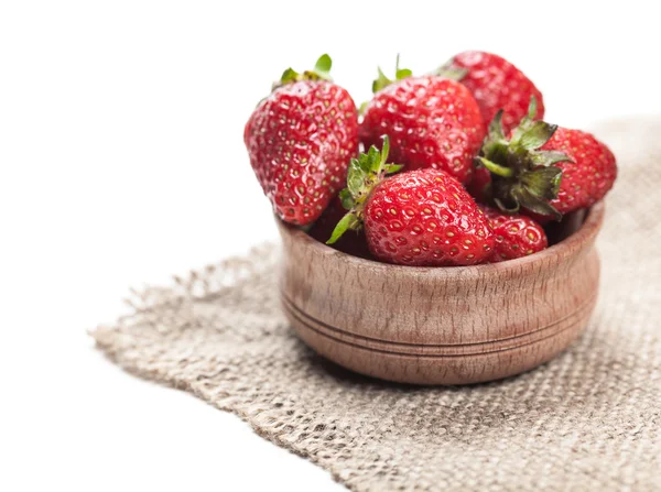 Ripe strawberry in wooden bowl — Stock Photo, Image