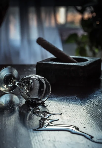 Glass of spilled wine — Stock Photo, Image