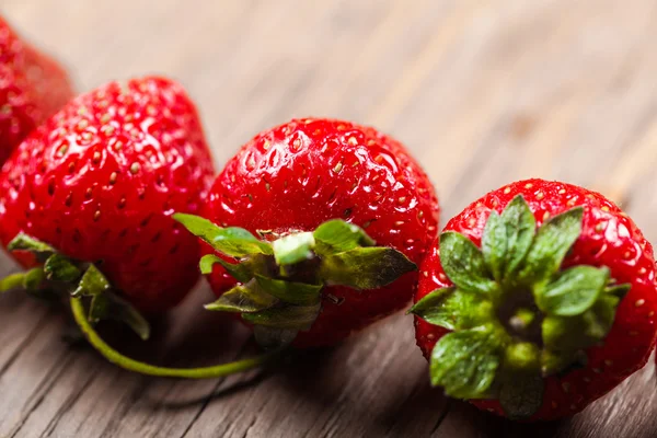 Three ripe strawberries close-up — Stock Photo, Image