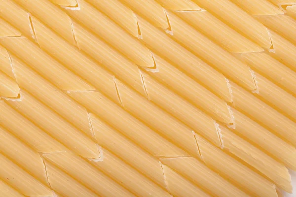 Textuur van ruwe pasta close-up — Stockfoto