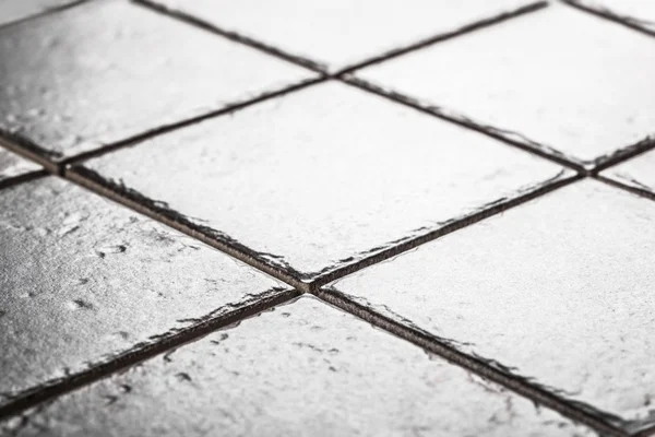Grijze keramische tegels close-up — Stockfoto