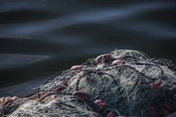 Ve svitcích, rybářská síť záběr — Stock fotografie