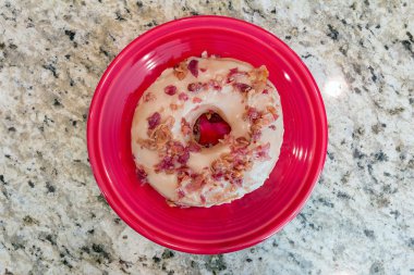 Bacon and Maple Donut on Red Plate clipart