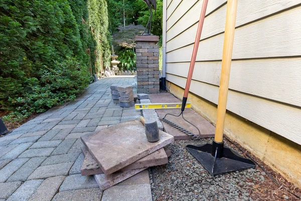 Stone Pavers and Tools for Side Yard House Landscaping — Stock Photo, Image