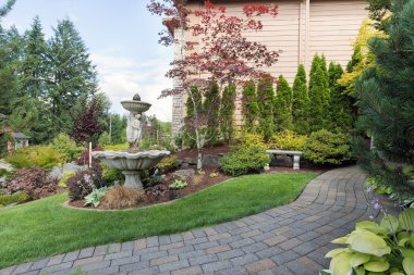 House Manicured Frontyard with Water Fountain clipart