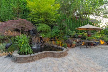 Backyard Landscaping Patio with Waterfall Pond  clipart