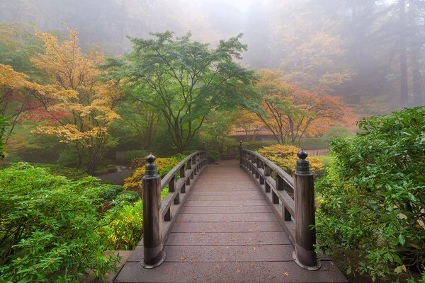 Moon Bridge in Foggy Fall Morning