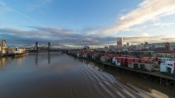 Time Lapse Movie of Moving Clouds and Auto Traffic with Water Reflection and Cityscape along Willamette River in Downtown Portland Oregon at Sunset 1080p — Stock Video