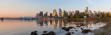 Vancouver BC Skyline from Stanley Park at Sunrise Panorama clipart