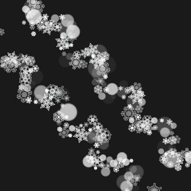 Siyah zemine düşen kar taneleri. Mutlu Noeller ve mutlu yıllar teması. Pankartlar, hediye kartları, parti davetiyeleri, ortak iltifatlar ve özel iş teklifleri için buz gibi kar taneleri.