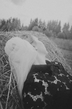 spring photo shoot in nature, beautiful girl walking in the park on a sunny day, close-up details