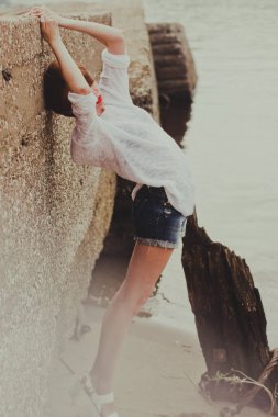 spring photo shoot in nature, beautiful girl walking in the park on a sunny day, close-up details