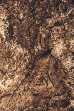 Yakın çekim kaya dokusu, kaya deseni ve dağlardaki kayaların soyutlanması.