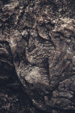 Yakın çekim kaya dokusu, kaya deseni ve dağlardaki kayaların soyutlanması.