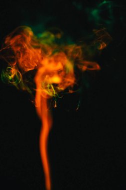 Turuncu ve kırmızı duman desenleri, güzel soyut renk arkaplanı