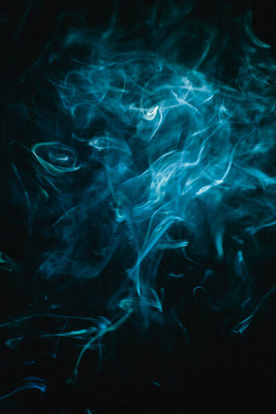 Color photo of smoke, blue smoke clouds close-up