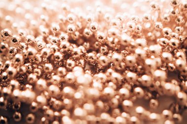 soyut turuncu bokeh arkaplan, bulanık boncuklar ve çelenkler