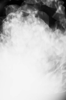 Siyah beyaz çelenk, parlak soyut arkaplan