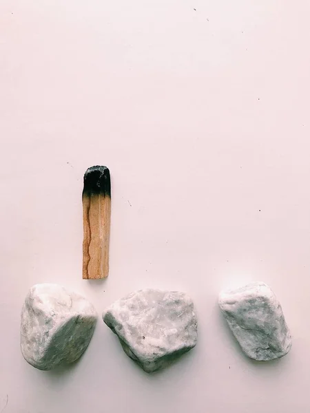 Natural incense White Sage and Palo Santo. Sacred tree of South America, color square photo.White Sage and Palo Santo on white background.