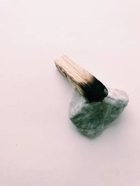 Natural incense White Sage and Palo Santo. Sacred tree of South America, color square photo.White Sage and Palo Santo on white background.