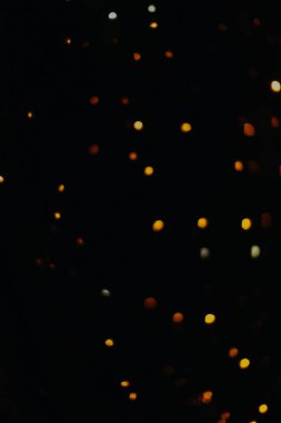 Bir Noel çelenginin soyut arkaplanı, Bokeh şeklinde bulanık ışıklar, metin için boşluk