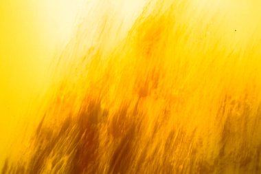 soyut turuncu arkaplan, bulanık ve belirsiz izler ve çizgiler, boya dokusu örtüsü, grafiklerde soyutlama