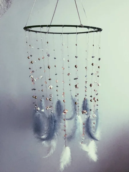 dream catcher with feathers and natural stones, ethnic decor